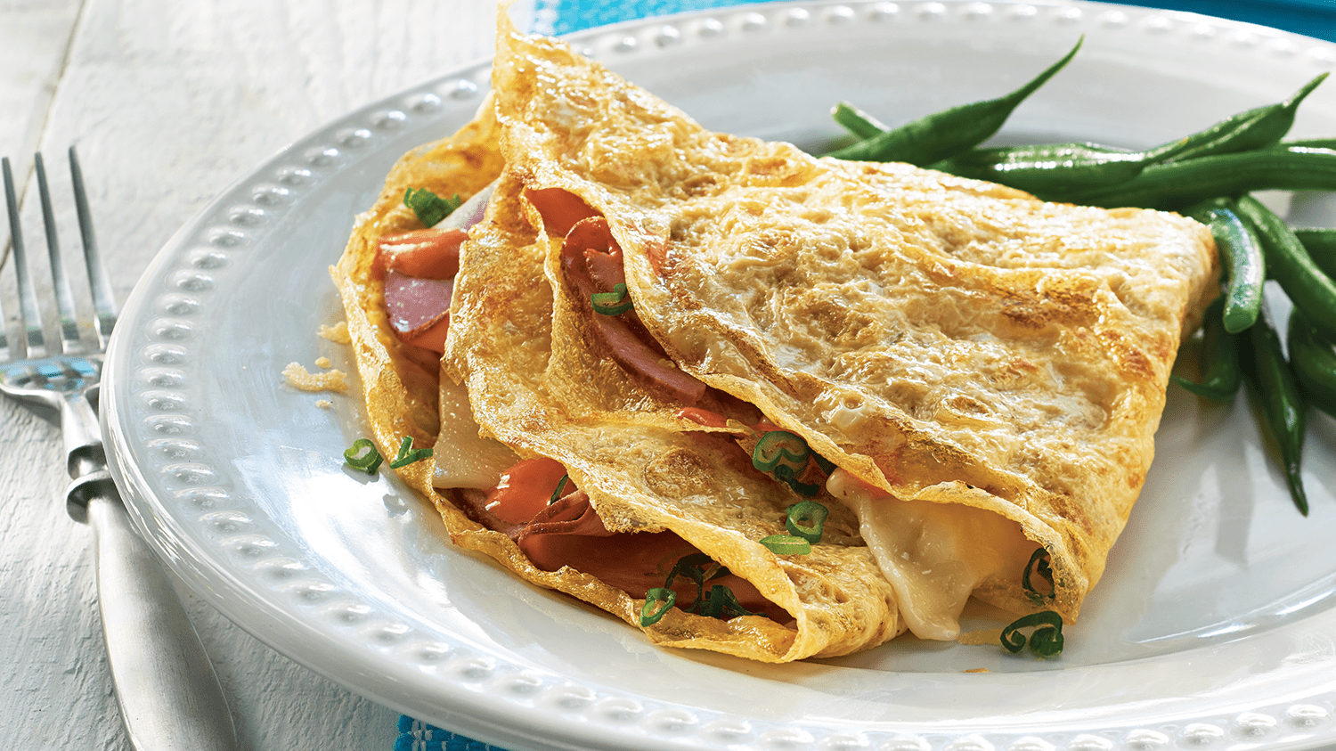 Ham and cheese egg crepes sriracha mayo